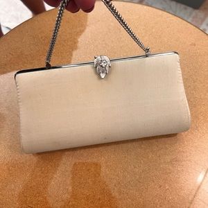 25% off listed price. Vintage formal clutch bag. Cream colored with chain handle